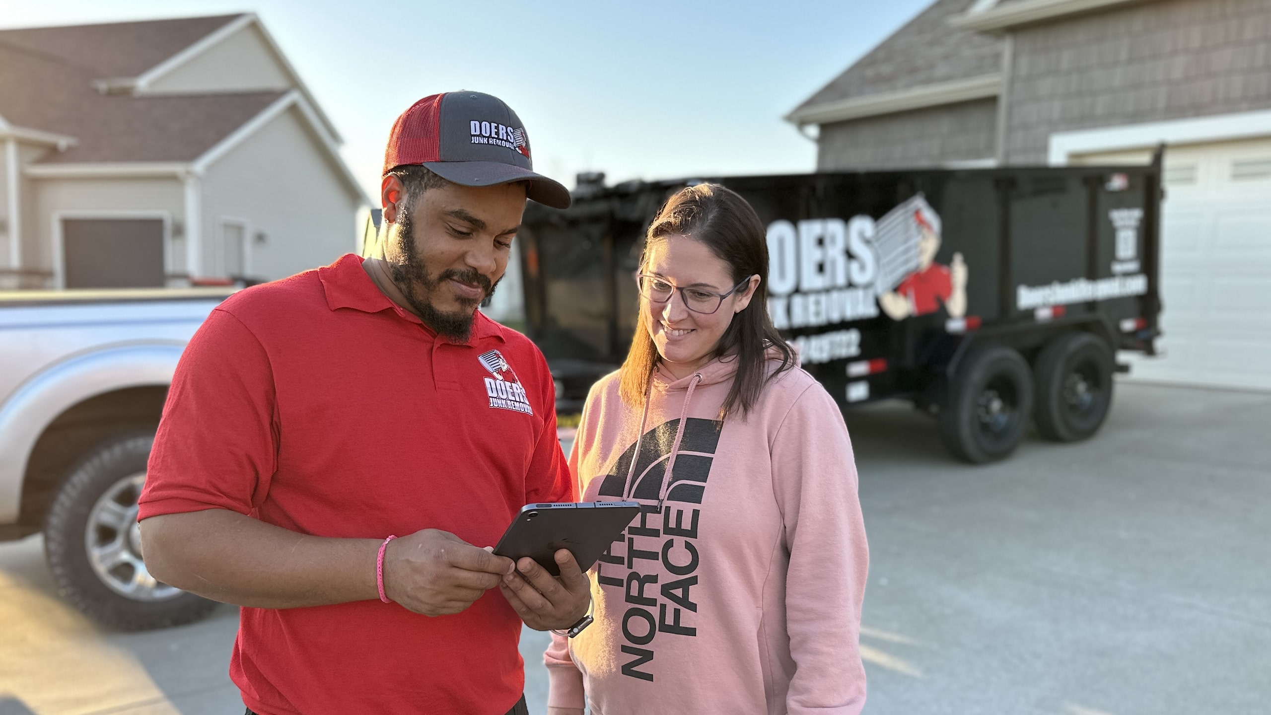 Friendly workers at Doers Junk Removal showing services we offer